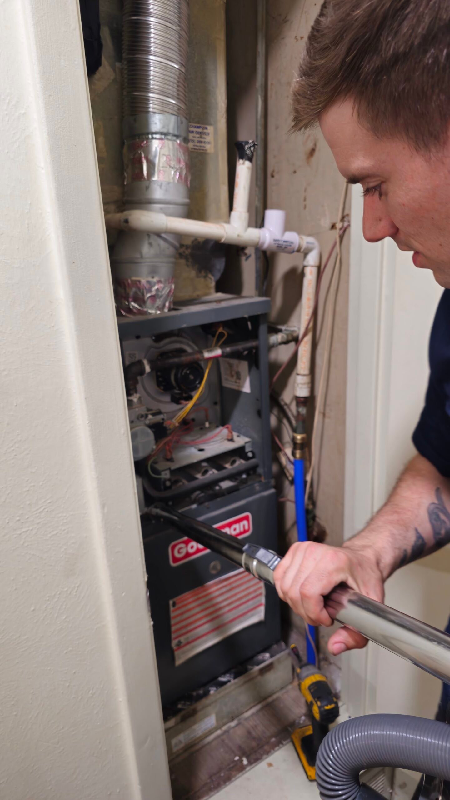 Texas Choice technician cleaning a dryer vent